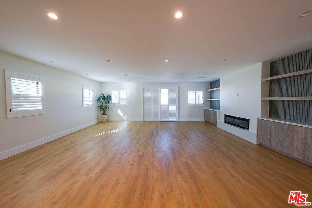Empty room, Fireplace, Interior, Recessed Lighting, Wood Texture Flooring