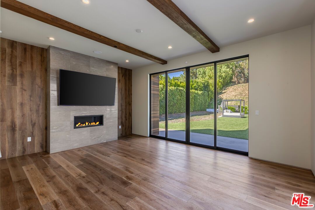 Empty room, Fireplace, Interior, Recessed Lighting, Wooden Beams, Wood Texture Flooring