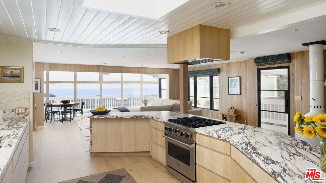 Dining room, Interior, Kitchen, Living room, Recessed Lighting, Stainless Steel Appliances, Water, Wood Texture Flooring