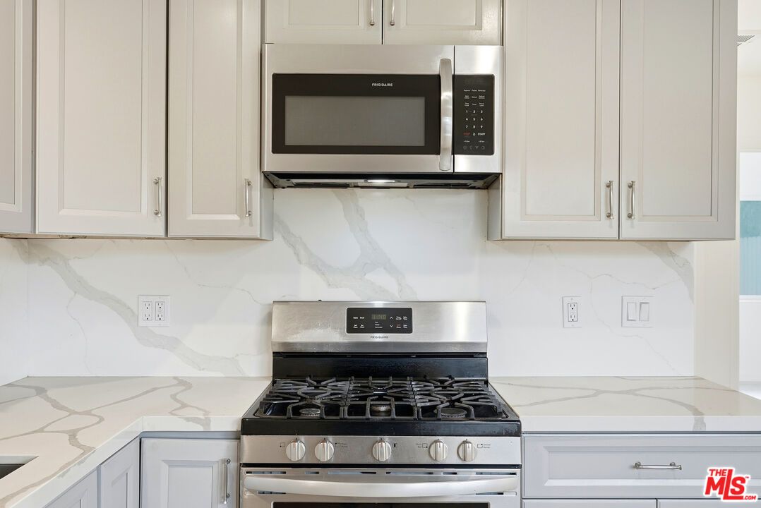Interior, Kitchen, Marble Walls, Stainless Steel Appliances