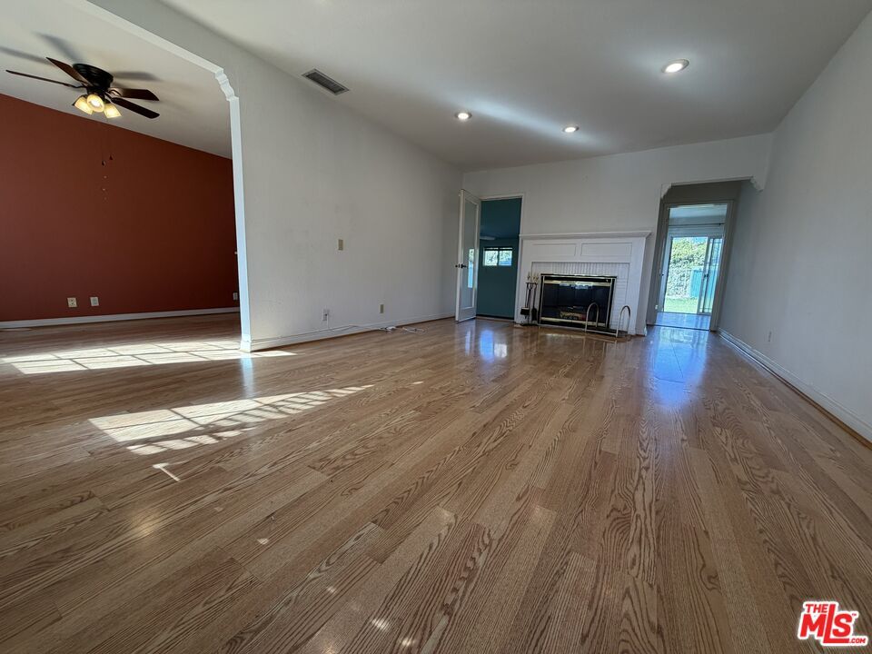 Empty room, Fireplace, Interior, Recessed Lighting, Wood Texture Flooring