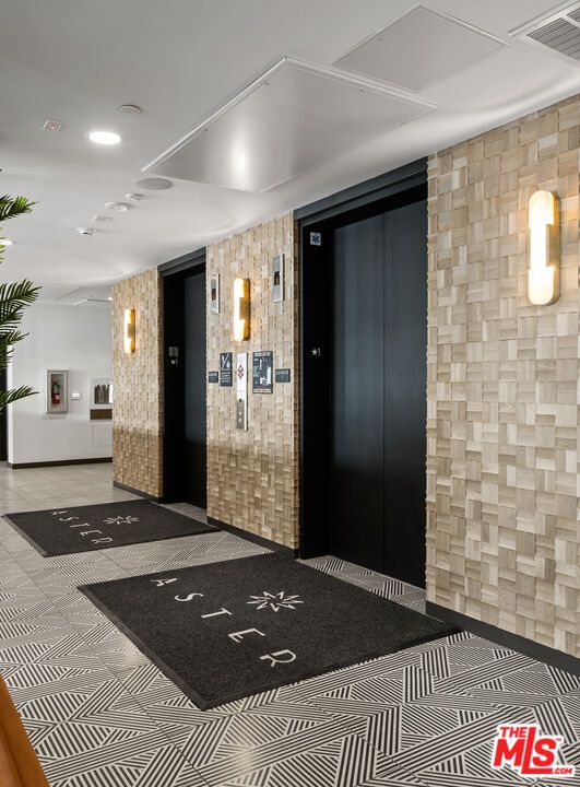 Elevator, Interior, Recessed Lighting, Stone Walls