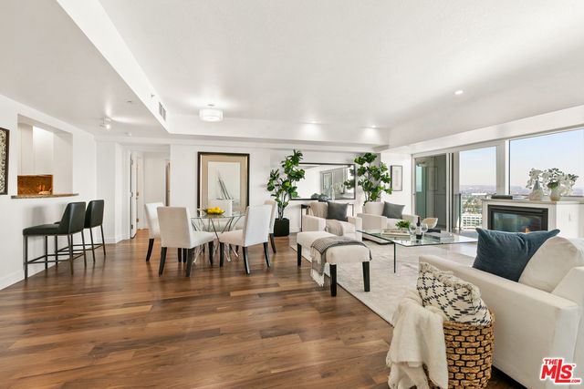 Dining room, Fireplace, Interior, Living room, Recessed Lighting, Wood Texture Flooring