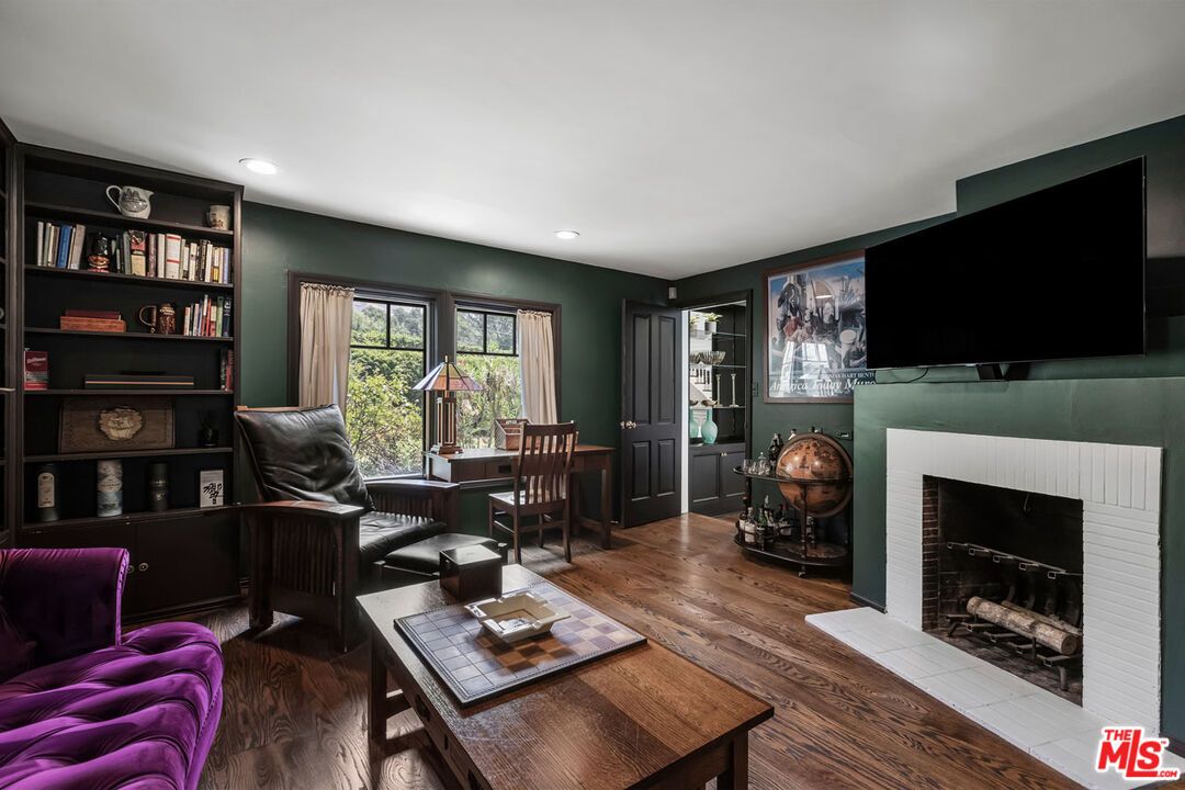 Dining room, Fireplace, Interior, Living room, Recessed Lighting, Wood Texture Flooring