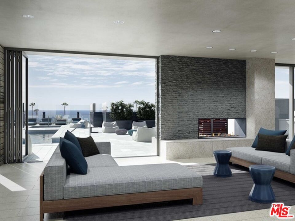 Bedroom, Fireplace, Interior, Living room, Recessed Lighting, Stone Walls, Water, Wood Texture Flooring