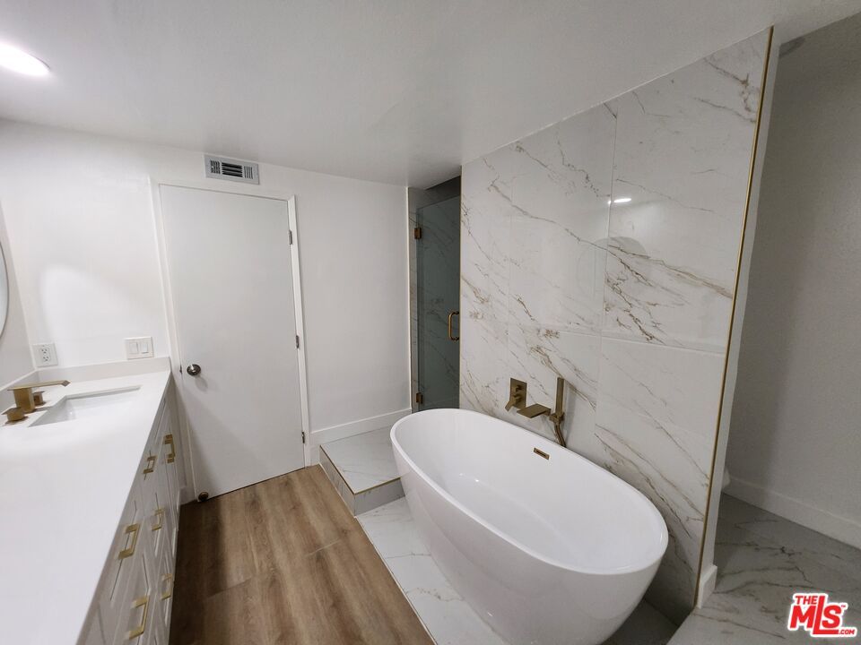 Bathroom, Free Standing Baths, Interior, Marble, Marble Walls, Recessed Lighting