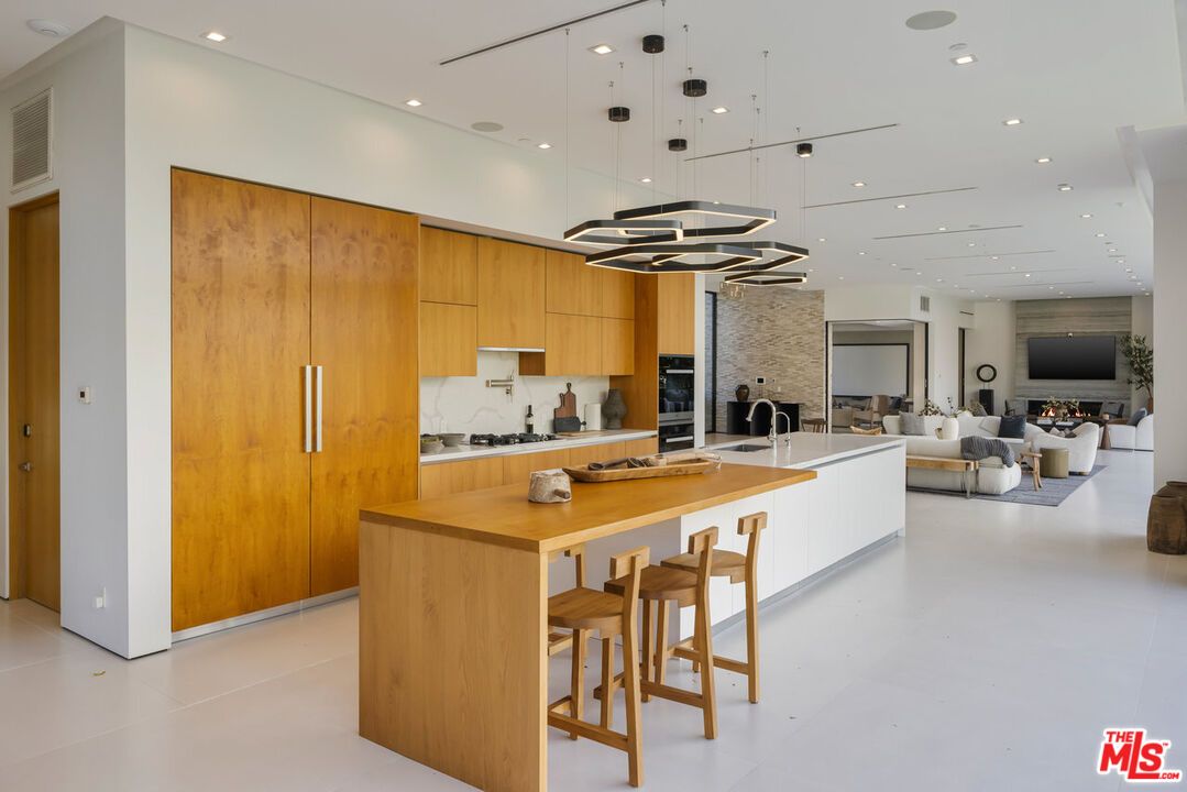 Fireplace, Interior, Kitchen, Living room, Pendant Lights, Recessed Lighting, Stainless Steel Appliances