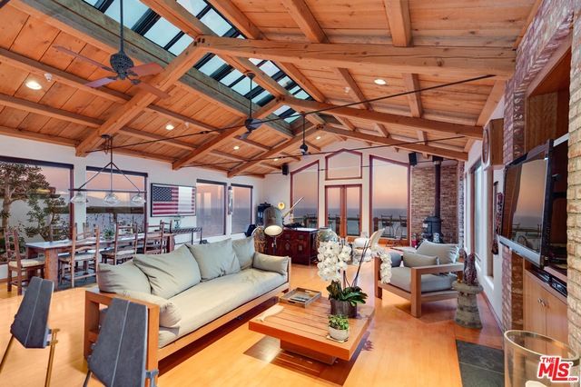 Dining room, Interior, Living room, Pendant Lights, Recessed Lighting, Stone Walls, Water, Wooden Beams, Wooden Ceilings, Wood Texture Flooring