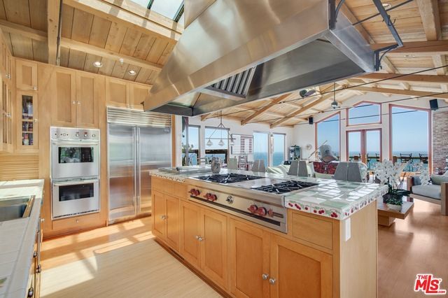 Interior, Kitchen, Living room, Pendant Lights, Stainless Steel Appliances, Tile Countertops, Water, Wooden Beams, Wooden Ceilings, Wood Texture Flooring