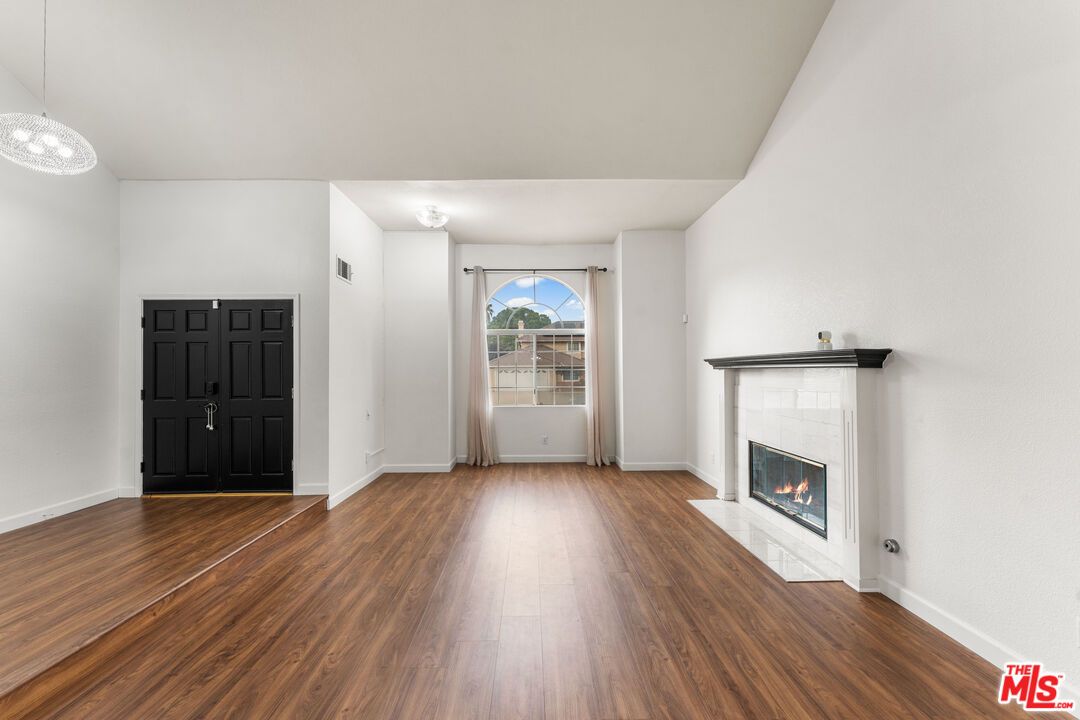 Empty room, Fireplace, Interior, Pendant Lights, Wood Texture Flooring