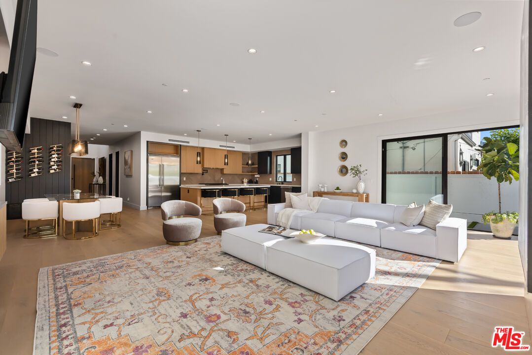 Dining room, Interior, Kitchen, Living room, Pendant Lights, Recessed Lighting, Stainless Steel Appliances, Wood Texture Flooring