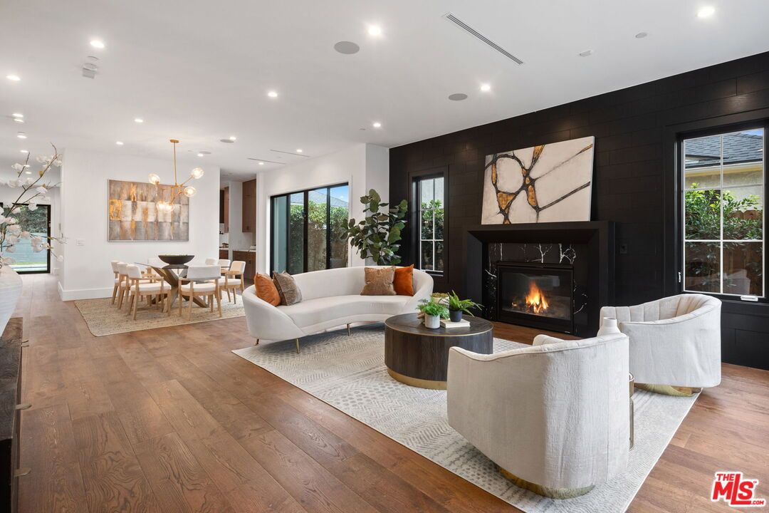 Dining room, Fireplace, Interior, Living room, Pendant Lights, Recessed Lighting, Wood Texture Flooring