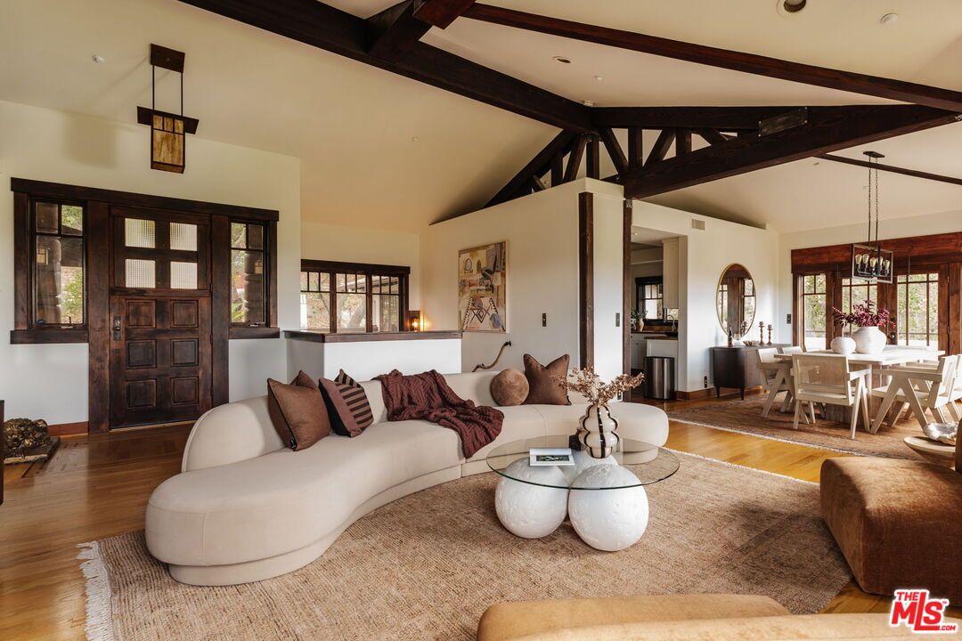 Chandelier, Dining room, Interior, Living room, Pendant Lights, Recessed Lighting, Wooden Beams, Wood Texture Flooring