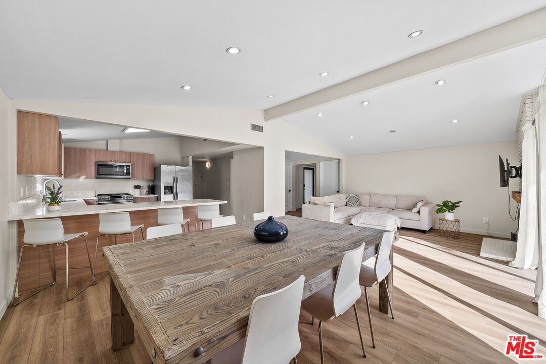 Dining room, Interior, Kitchen, Living room, Recessed Lighting, Stainless Steel Appliances, Wood Texture Flooring