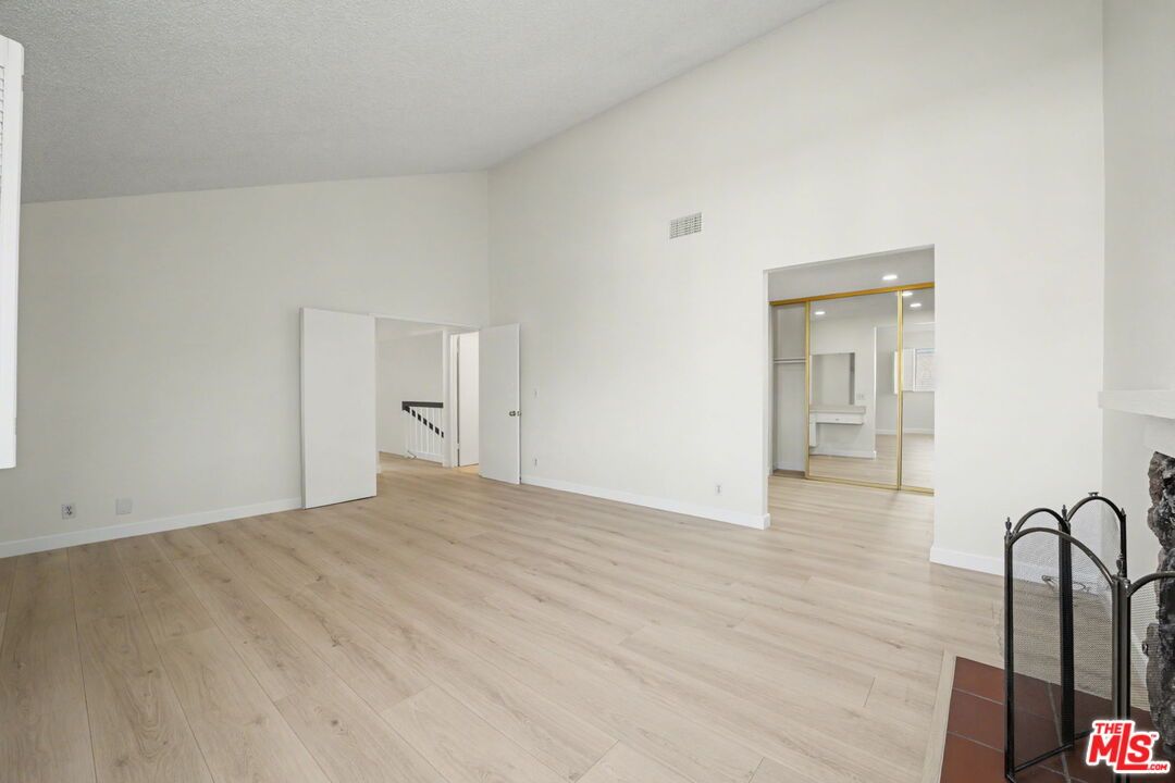 Empty room, Fireplace, Interior, Recessed Lighting, Wood Texture Flooring