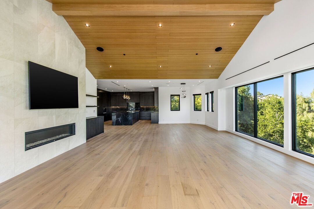 Empty room, Fireplace, Interior, Pendant Lights, Recessed Lighting, Wooden Ceilings, Wood Texture Flooring