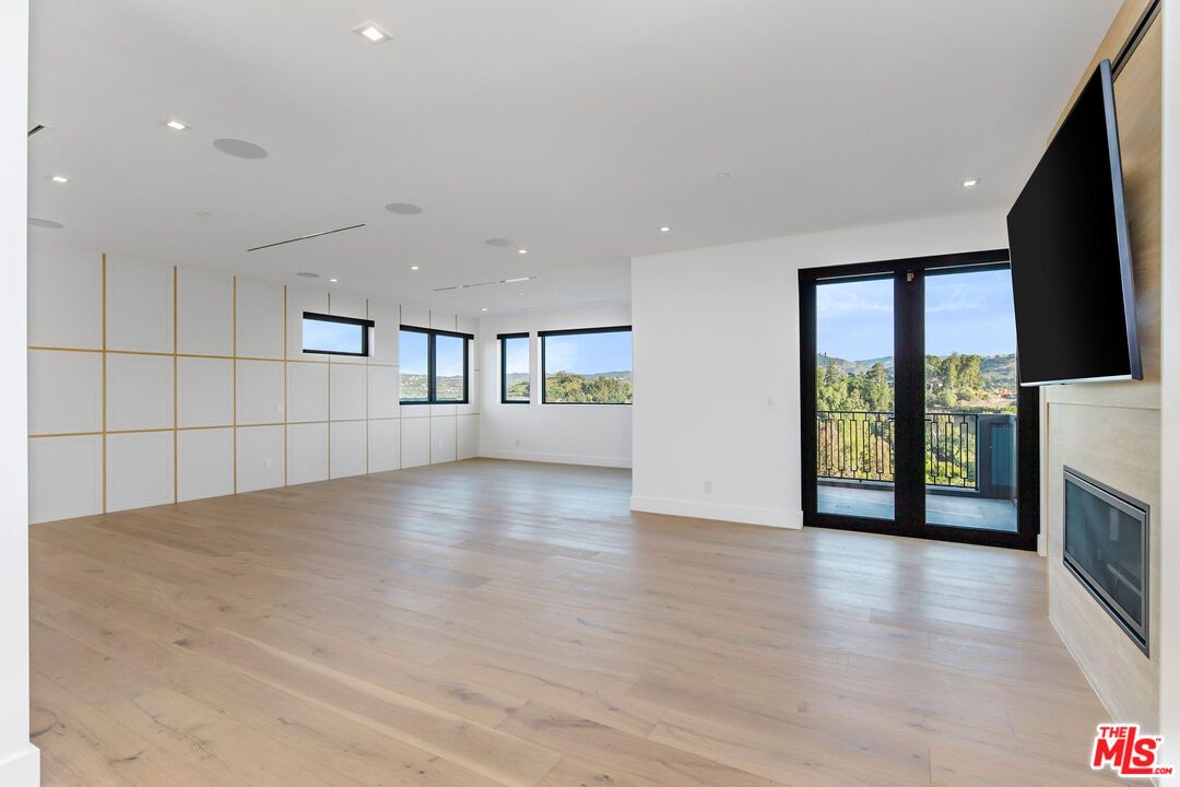 Empty room, Fireplace, Interior, Pendant Lights, Recessed Lighting, Wood Texture Flooring