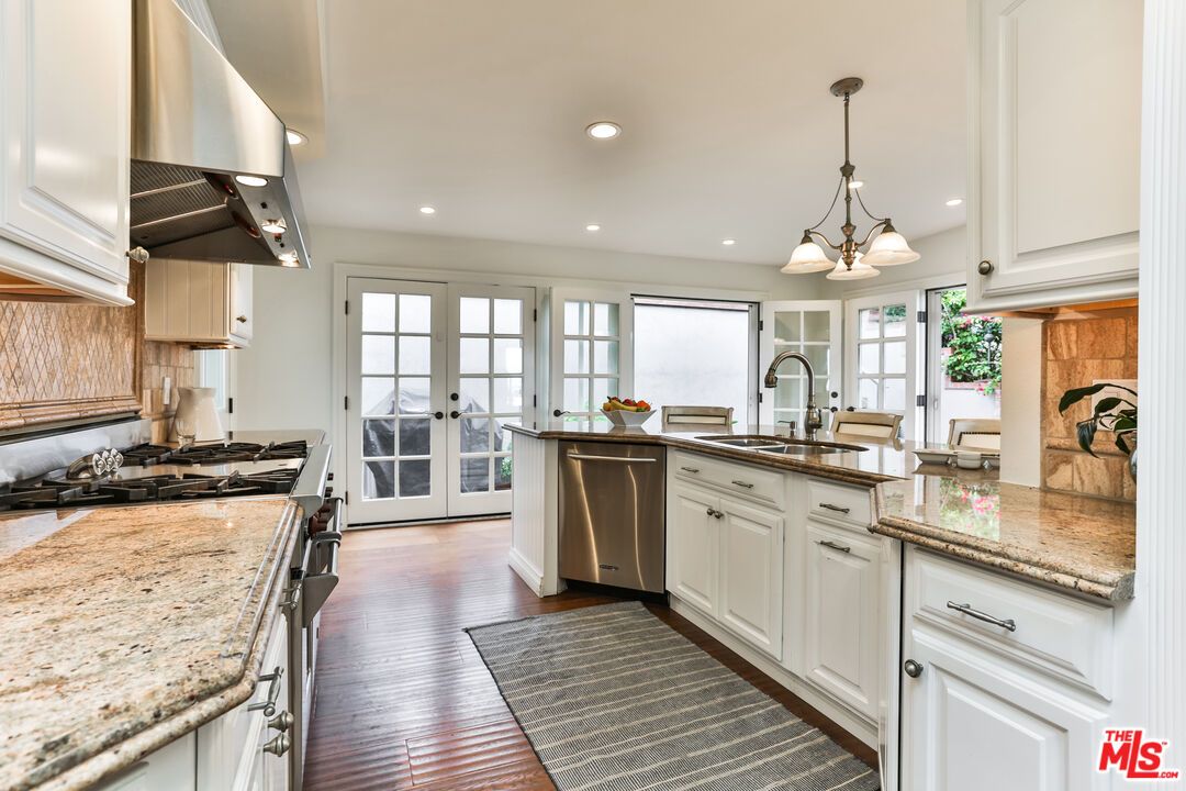 Chandelier, Interior, Kitchen, Pendant Lights, Recessed Lighting, Stainless Steel Appliances, Wood Texture Flooring