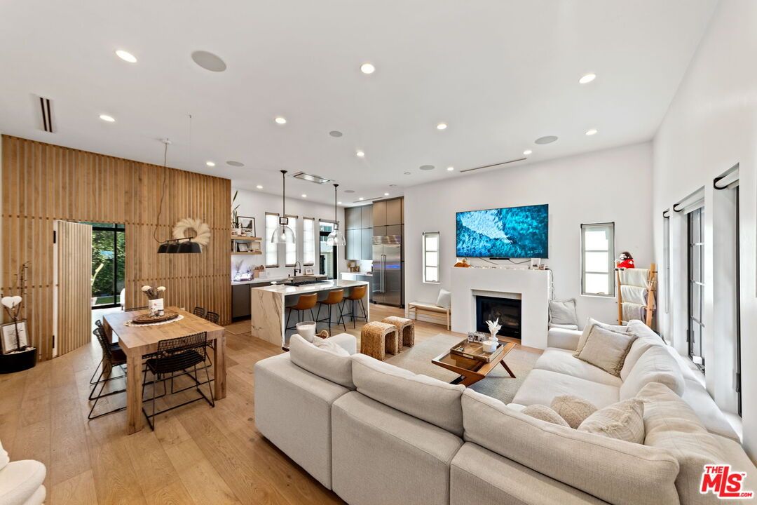 Dining room, Fireplace, Interior, Kitchen, Living room, Pendant Lights, Recessed Lighting, Wood Texture Flooring, Wooden Walls