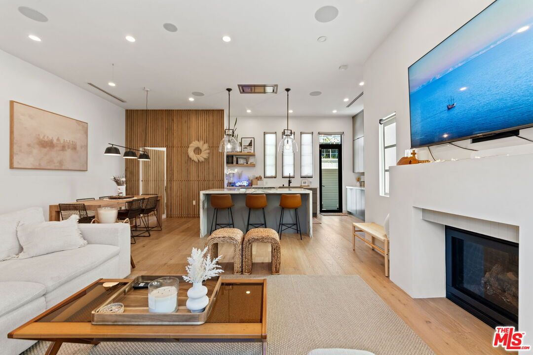 Dining room, Fireplace, Interior, Kitchen, Living room, Pendant Lights, Recessed Lighting, Wood Texture Flooring