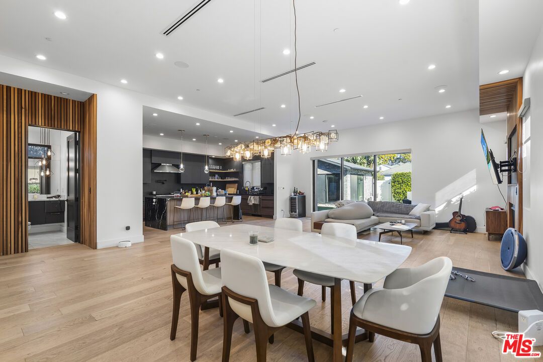 Dining room, Interior, Kitchen, Living room, Pendant Lights, Recessed Lighting, Stainless Steel Appliances, Wood Texture Flooring