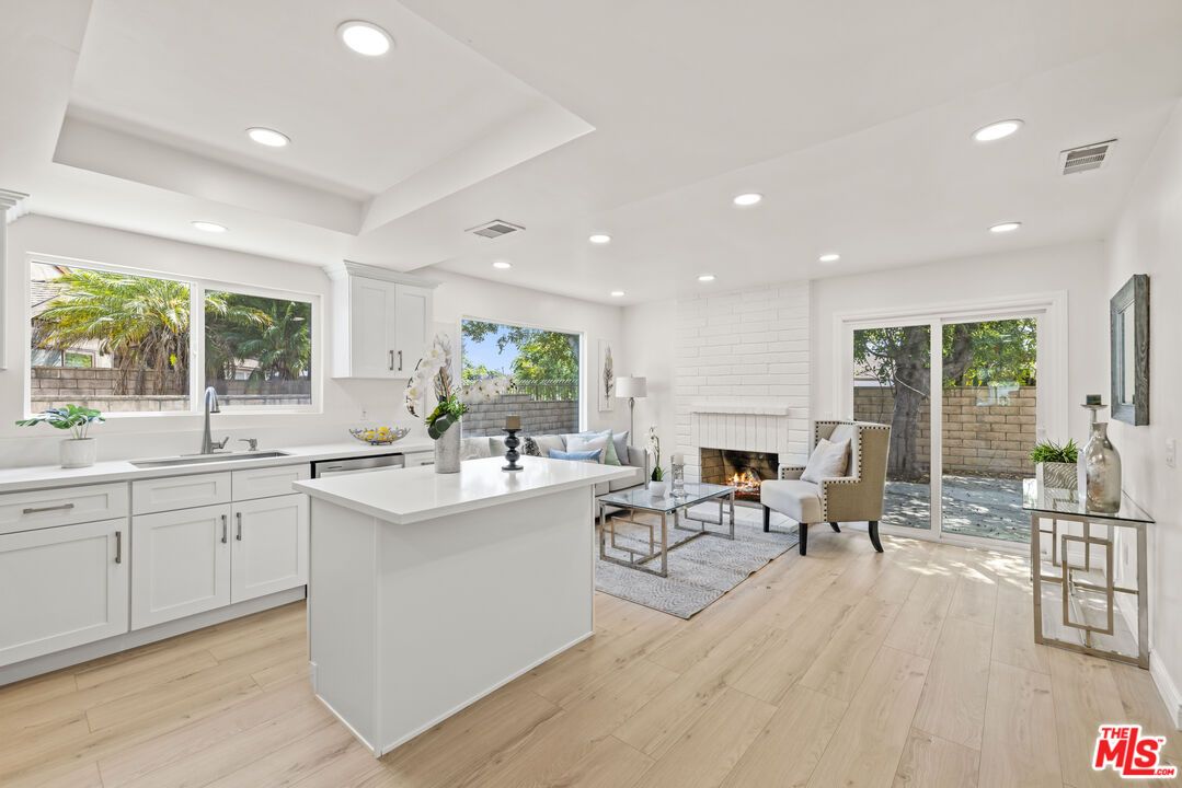 Fireplace, Interior, Kitchen, Living room, Recessed Lighting, Wood Texture Flooring