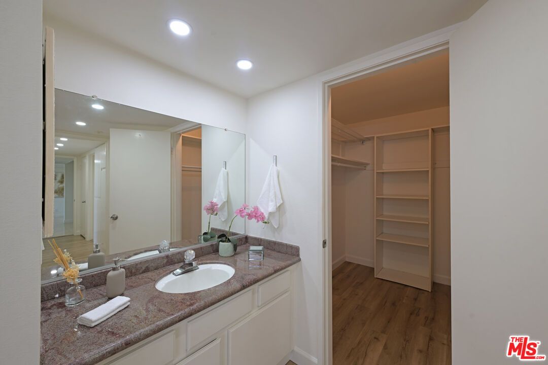 Bathroom, Dual Sink Vanities, Interior, Recessed Lighting, Walk-in Closets, Wood Texture Flooring