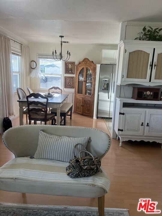 Chandelier, Dining room, Interior, Kitchen, Stainless Steel Appliances, Wood Texture Flooring