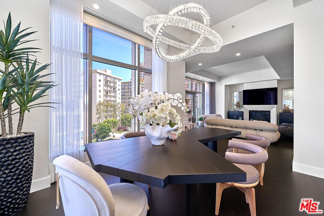 Dining room, Fireplace, Interior, Living room, Pendant Lights, Recessed Lighting, Wood Texture Flooring