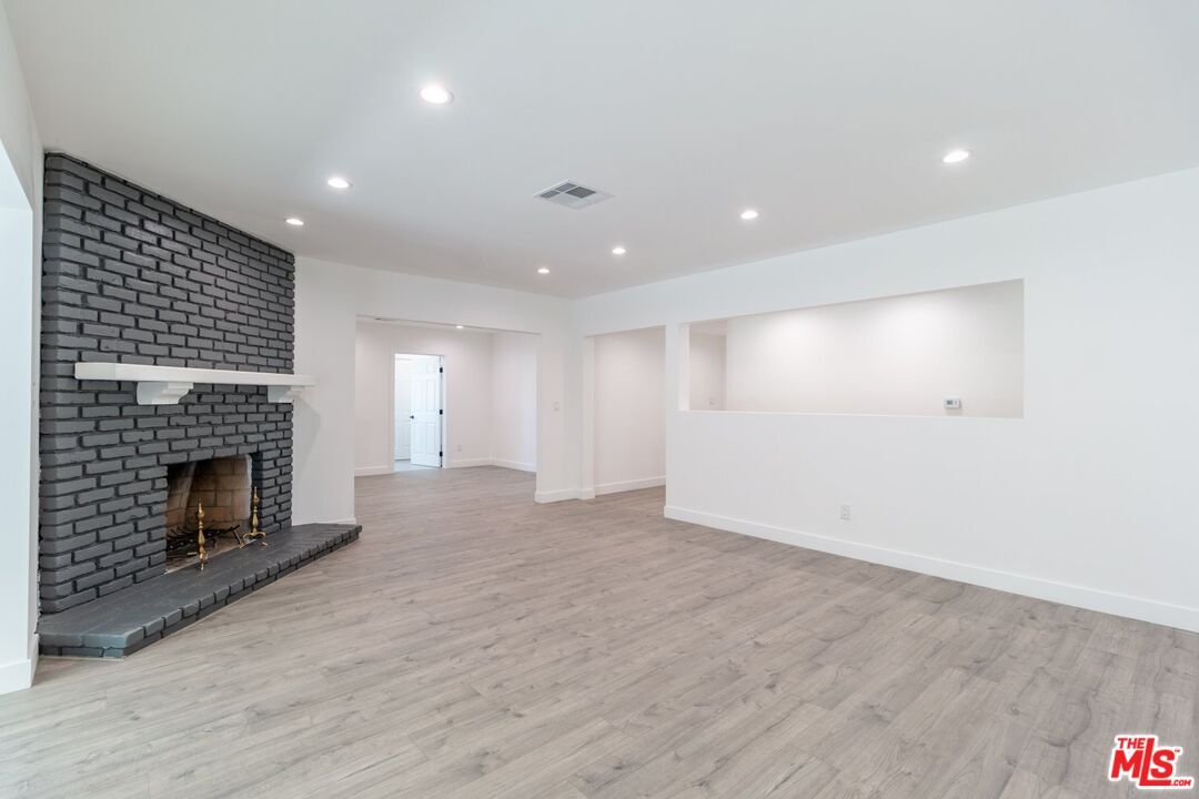 Empty room, Fireplace, Interior, Recessed Lighting, Wood Texture Flooring