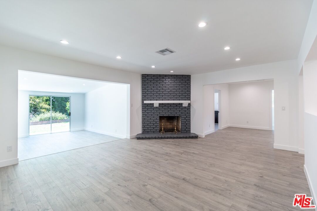 Empty room, Fireplace, Interior, Recessed Lighting, Wood Texture Flooring