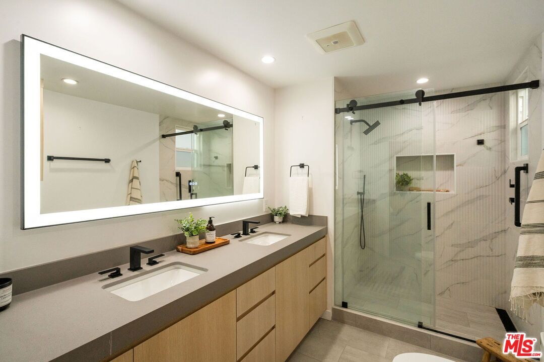 Bathroom, Dual Sink Vanities, Glass Shower, Interior, Marble Walls, Recessed Lighting