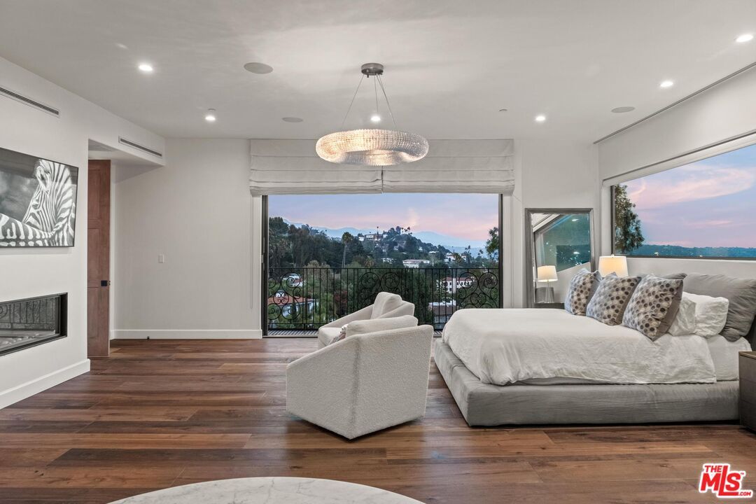 Bedroom, Fireplace, Interior, Pendant Lights, Recessed Lighting, Wood Texture Flooring