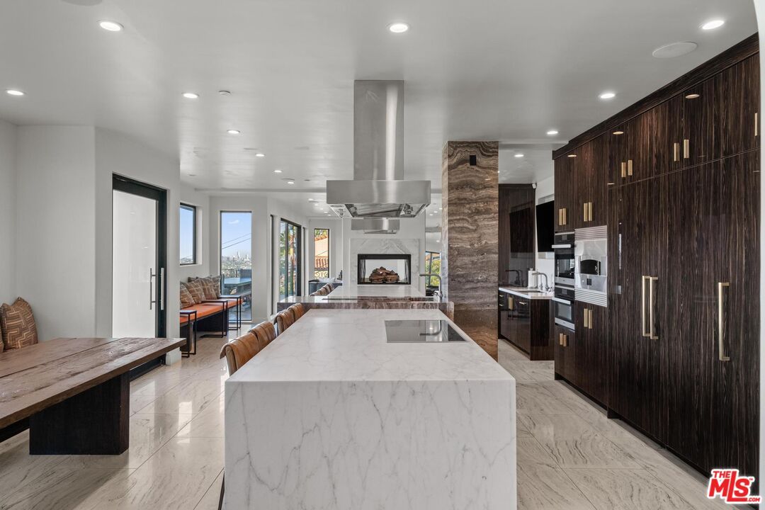 Fireplace, Interior, Kitchen, Living room, Marble, Recessed Lighting, Stainless Steel Appliances