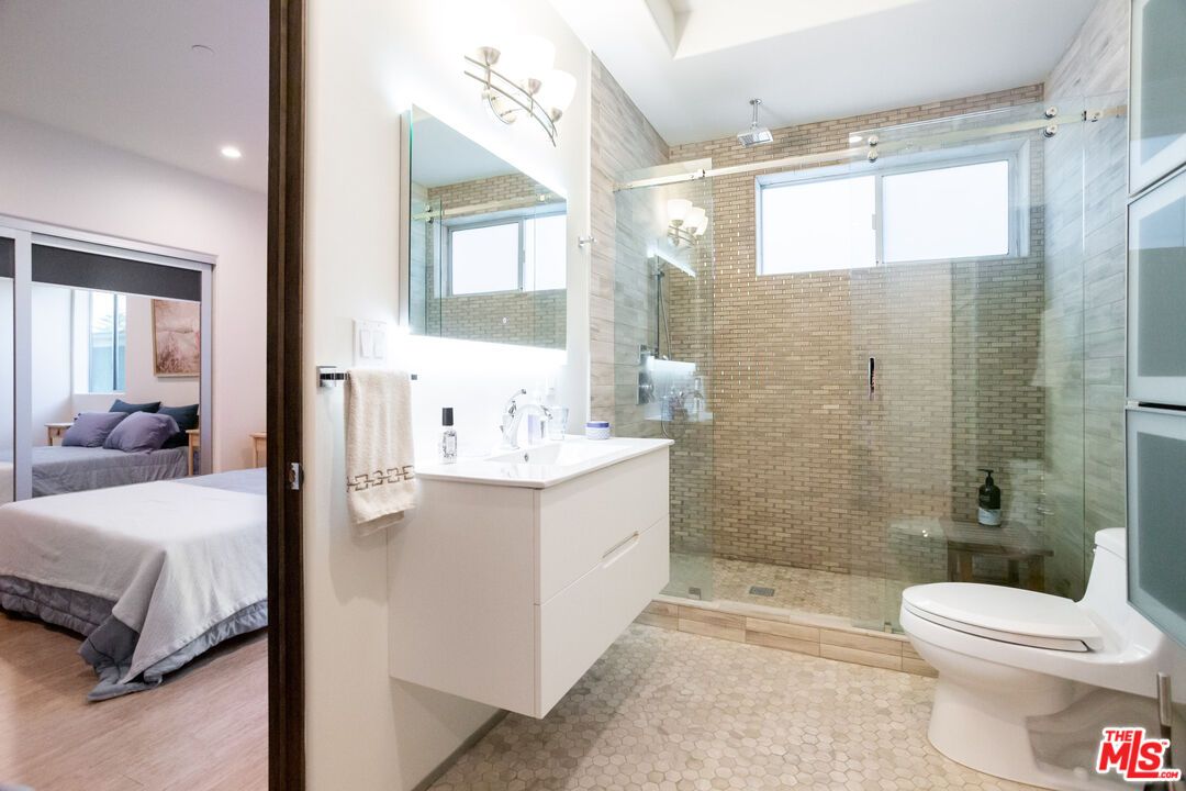 Bathroom, Bedroom, Glass Shower, Interior, Recessed Lighting, Wood Texture Flooring