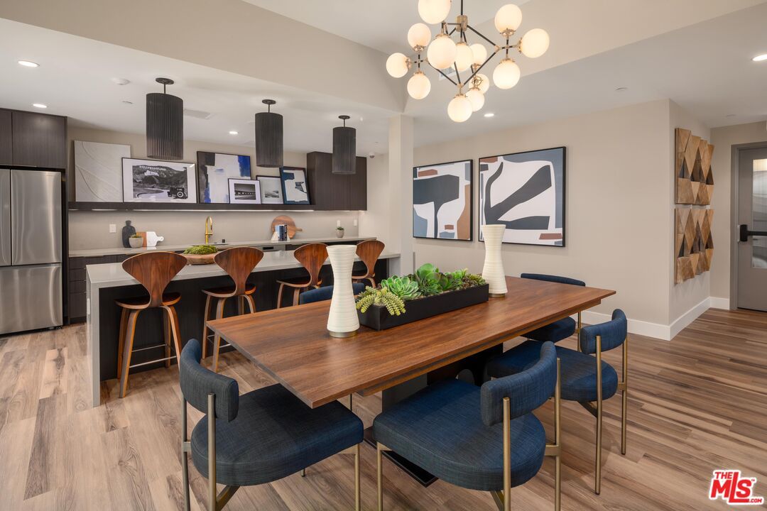 Dining room, Interior, Kitchen, Pendant Lights, Recessed Lighting, Stainless Steel Appliances, Wood Texture Flooring