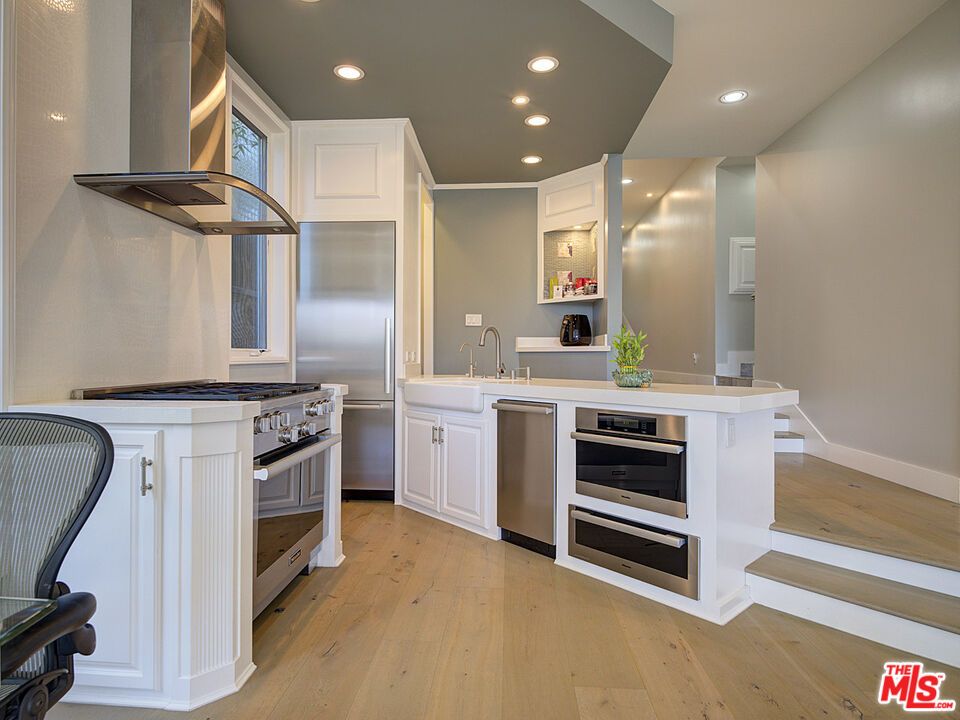 Dining room, Interior, Kitchen, Recessed Lighting, Stainless Steel Appliances, Wood Texture Flooring