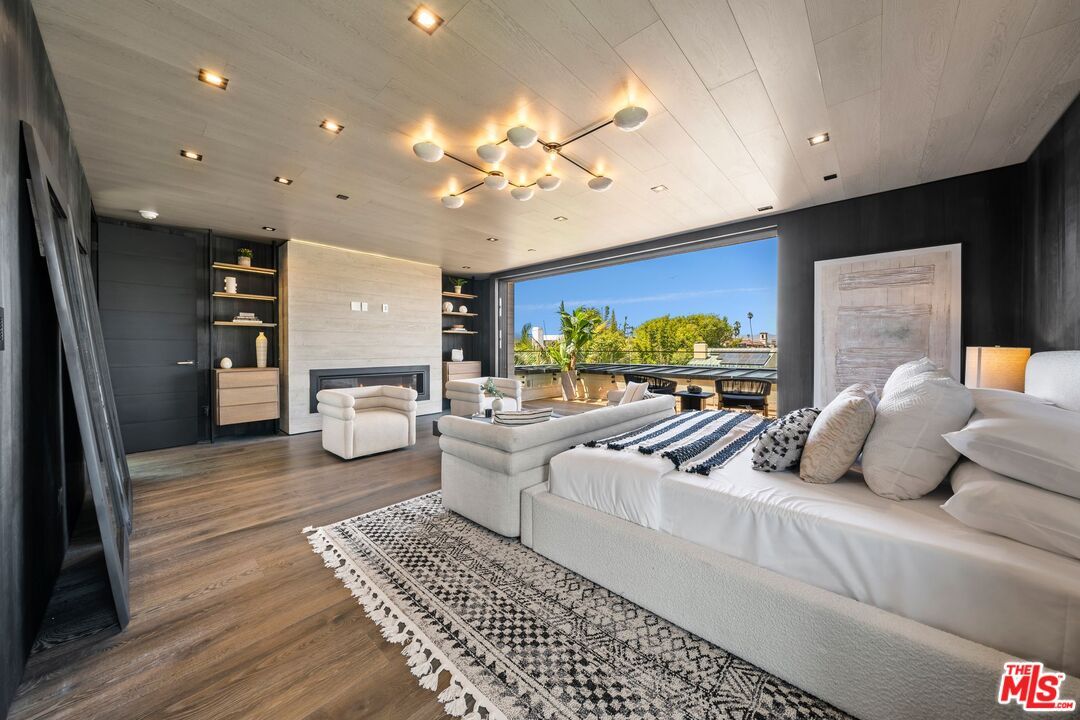 Bedroom, Fireplace, Interior, Recessed Lighting, Wood Texture Flooring