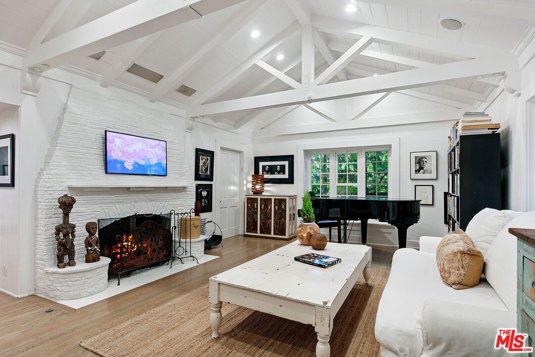 Fireplace, Interior, Living room, Piano, Recessed Lighting, Wood Texture Flooring