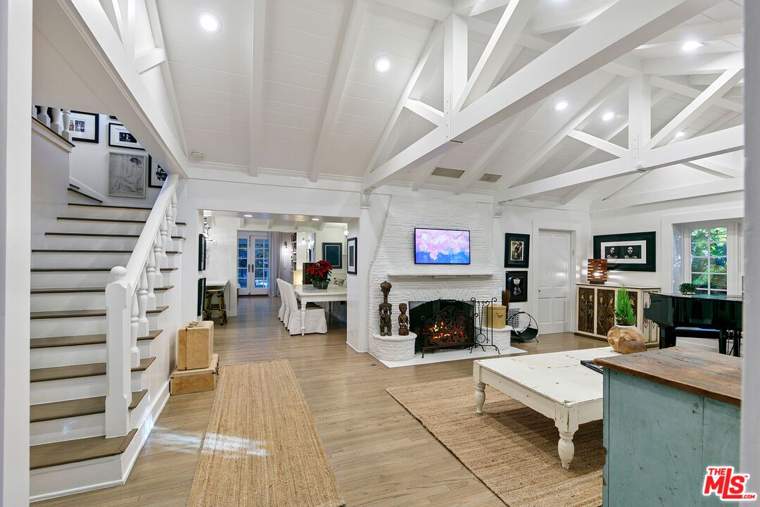 Fireplace, Interior, Living room, Piano, Recessed Lighting, Wood Texture Flooring