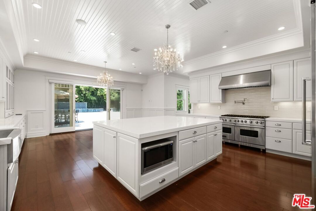 Chandelier, Interior, Kitchen, Recessed Lighting, Stainless Steel Appliances, Wood Texture Flooring