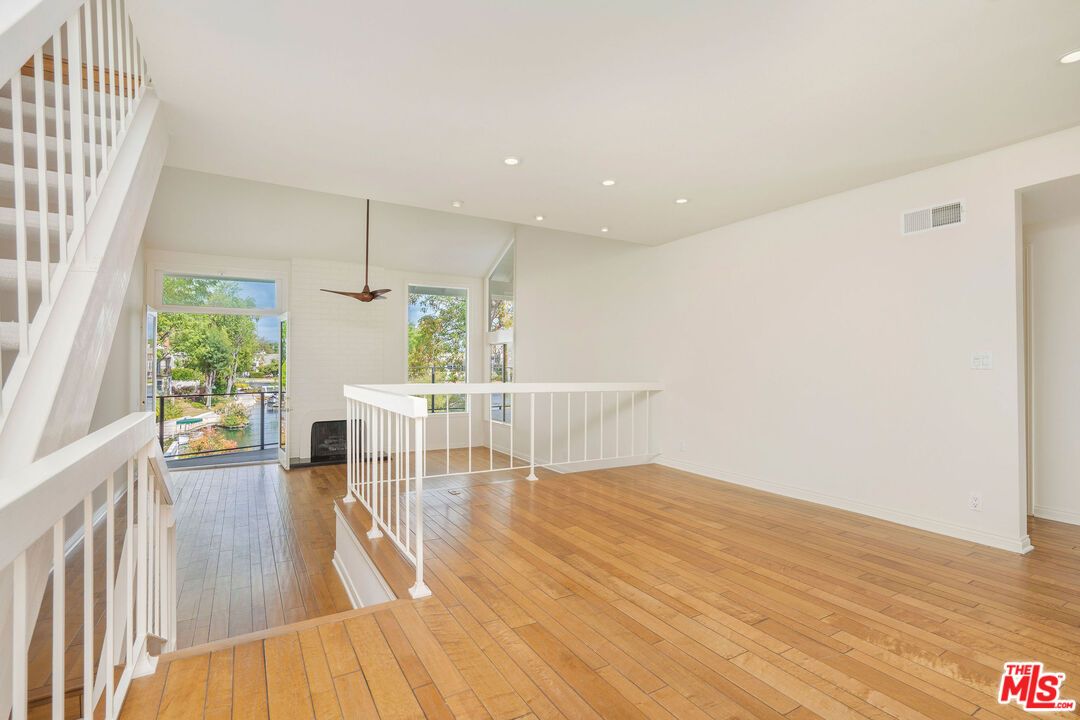 Fireplace, Interior, Pendant Lights, Recessed Lighting, Wood Texture Flooring