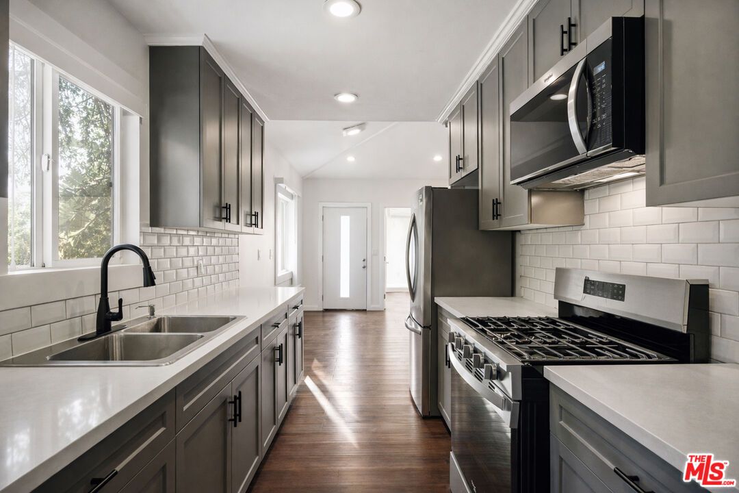 Interior, Kitchen, Recessed Lighting, Stainless Steel Appliances, Wood Texture Flooring