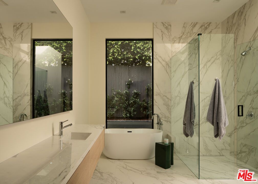 Bathroom, Dual Sink Vanities, Free Standing Baths, Glass Shower, Interior, Marble, Marble Walls, Recessed Lighting