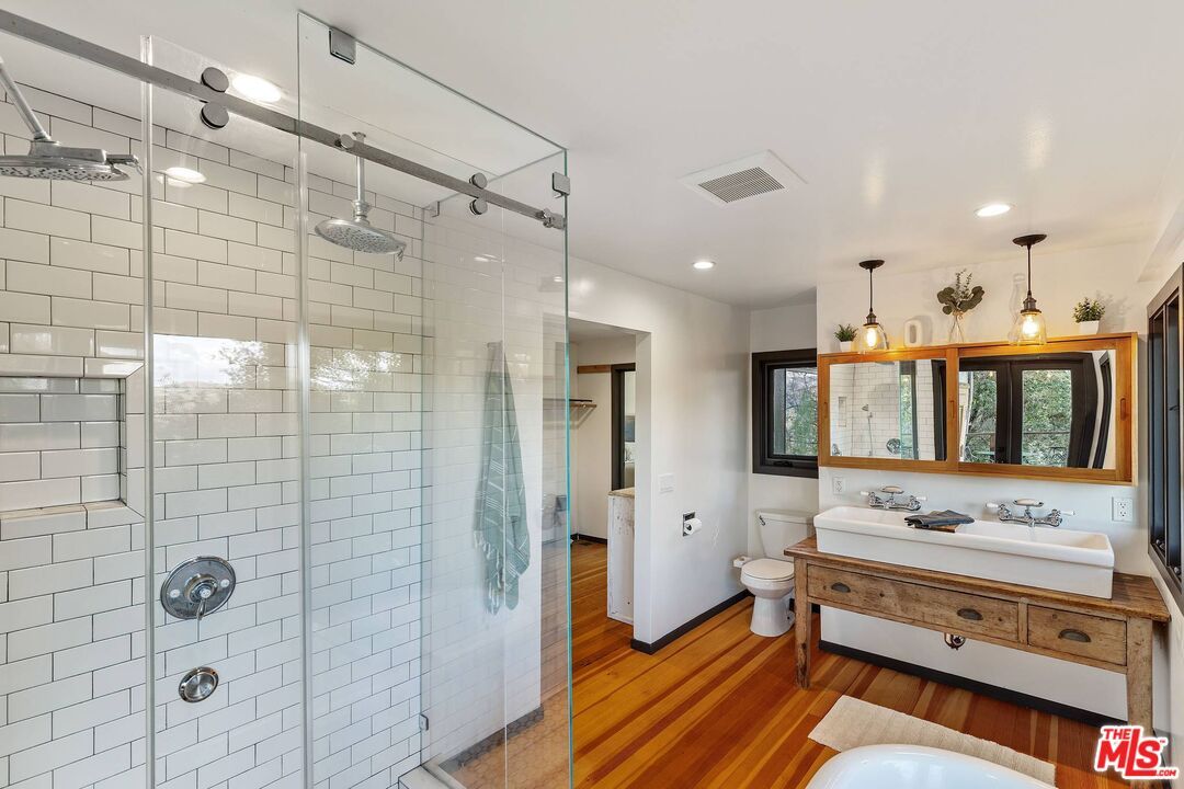 Bathroom, Glass Shower, Interior, Pendant Lights, Recessed Lighting, Wood Texture Flooring