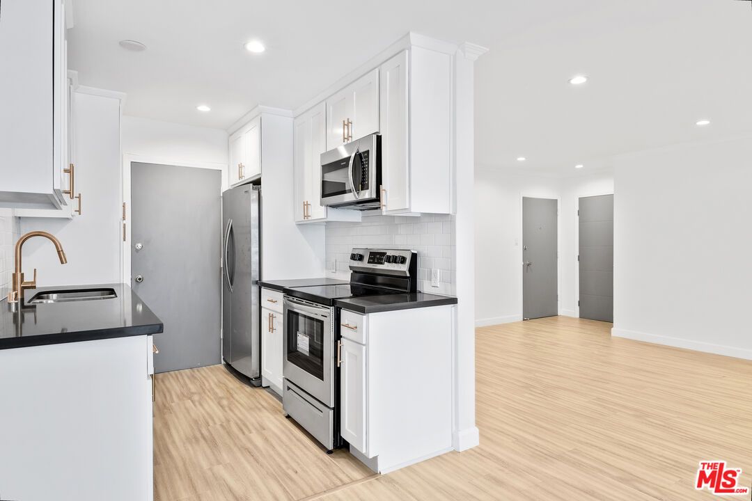 Interior, Kitchen, Recessed Lighting, Stainless Steel Appliances, Wood Texture Flooring