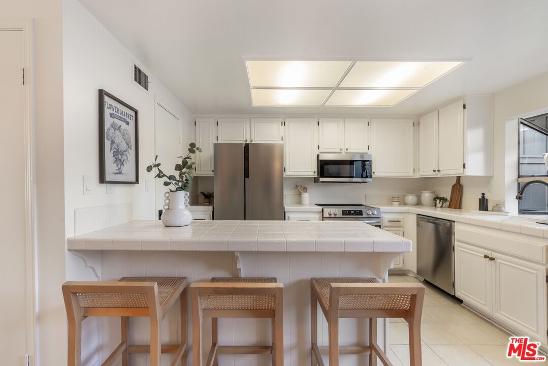 Interior, Kitchen, Stainless Steel Appliances, Tile Countertops