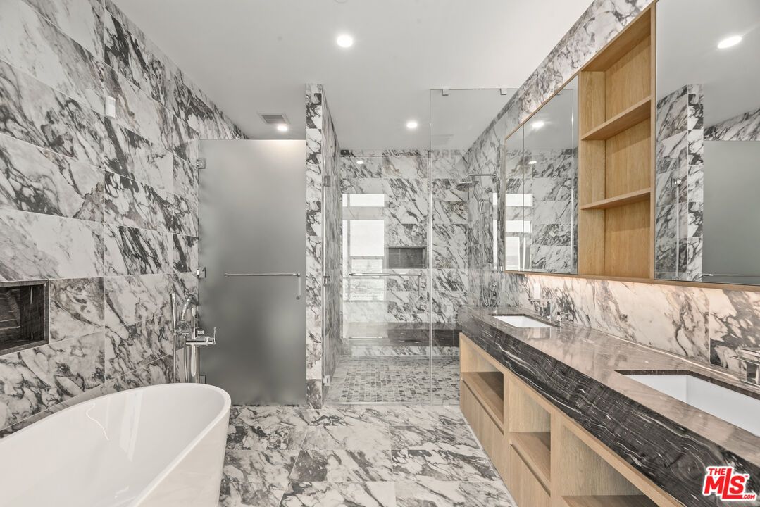 Bathroom, Dual Sink Vanities, Free Standing Baths, Glass Shower, Interior, Marble, Marble Walls, Recessed Lighting