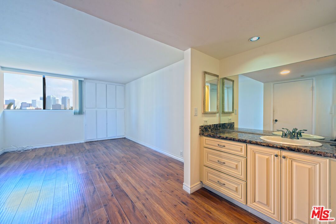 Bathroom, Dual Sink Vanities, Interior, Recessed Lighting, Wood Texture Flooring