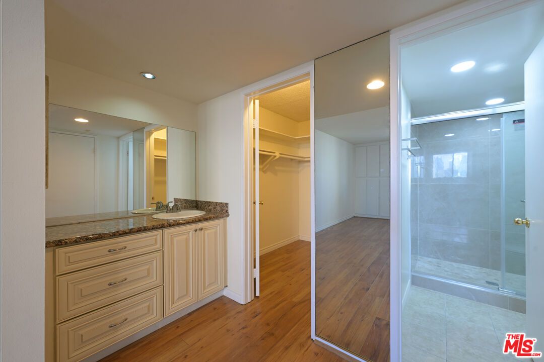 Bathroom, Glass Shower, Interior, Recessed Lighting, Walk-in Closets, Wood Texture Flooring